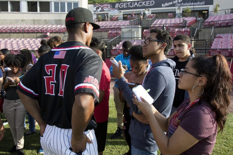 Students interviewing New Jersey Jackals baseball player